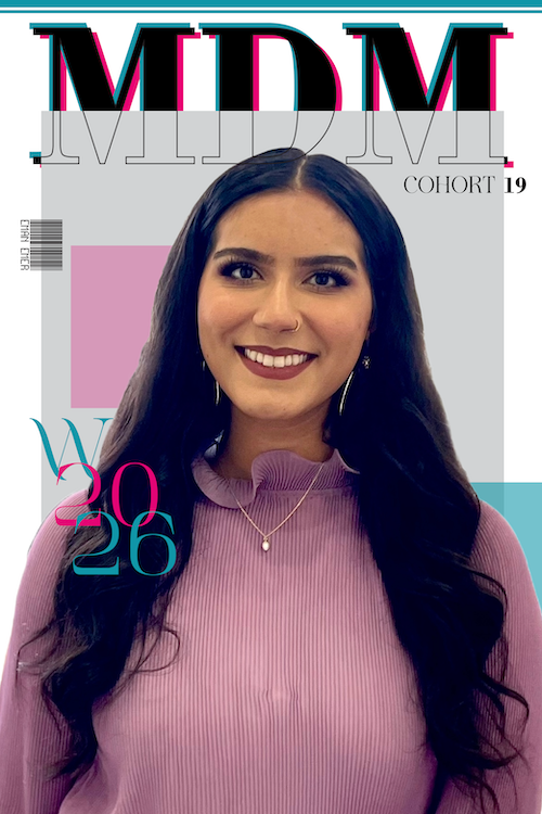 "A magazine-style portrait of a smiling young woman, Eman Amer, for MDM Cohort 19. She is wearing a lilac ruffled high-neck top and a delicate necklace. The editorial layout features grey, pink, and teal geometric blocks with large stylized 'MDM' text at the top and 'W 2026' overlaid on the left. Her name, Eman Amer, is printed vertically on the left side next to a small barcode graphic."