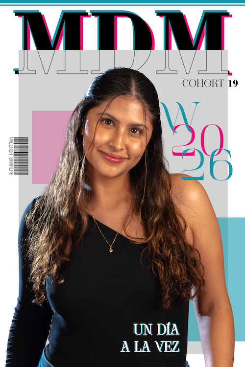 "A magazine-style portrait of a smiling young woman, Valeria Barrera, for MDM Cohort 19. She is wearing a black one-shoulder top and a gold necklace. The editorial layout includes grey, pink, and teal geometric blocks, with large stylized 'MDM' text at the top and 'W 2026' overlaid on the right. White text at the bottom right reads: 'UN DÍA A LA VEZ.' Her name, Valeria Barrera, is printed vertically on the left side beside a barcode graphic."