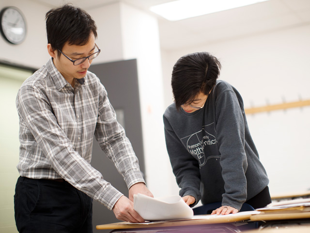 Undergraduate math students working on a special project.