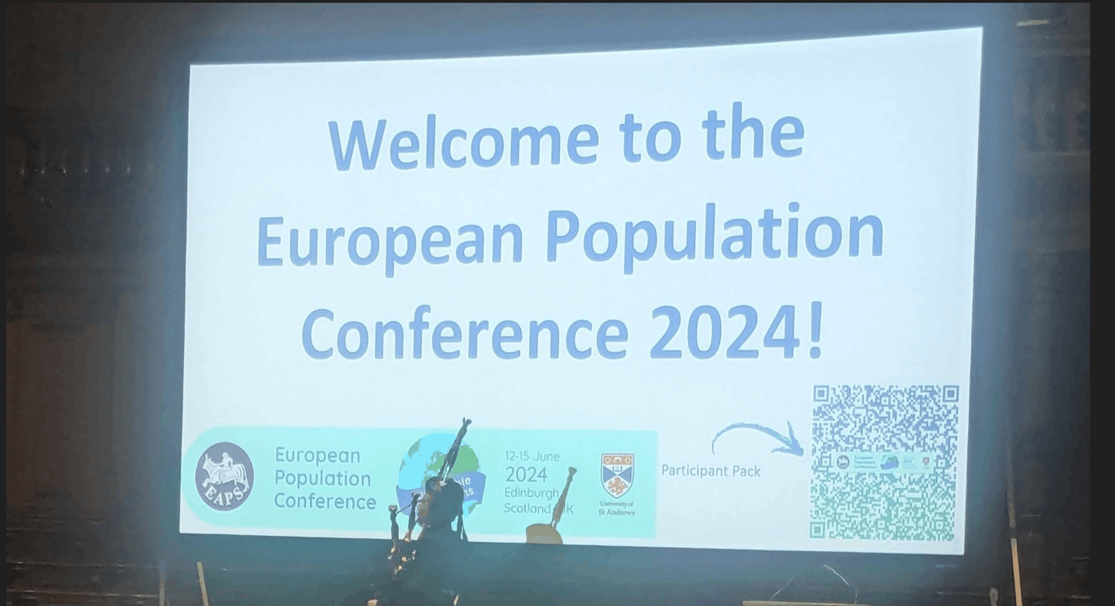 Projection screen reading Welcome to the European Population Conference 2024!