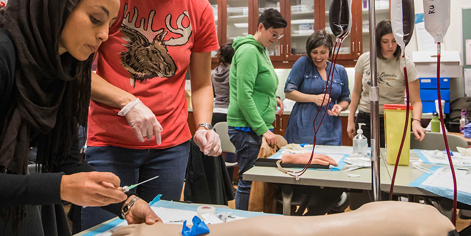 Students practising key techniques in the lab