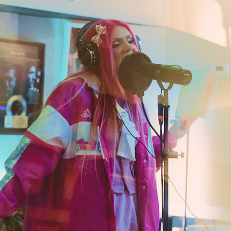 Student Carina Bianchini recording in a music studio