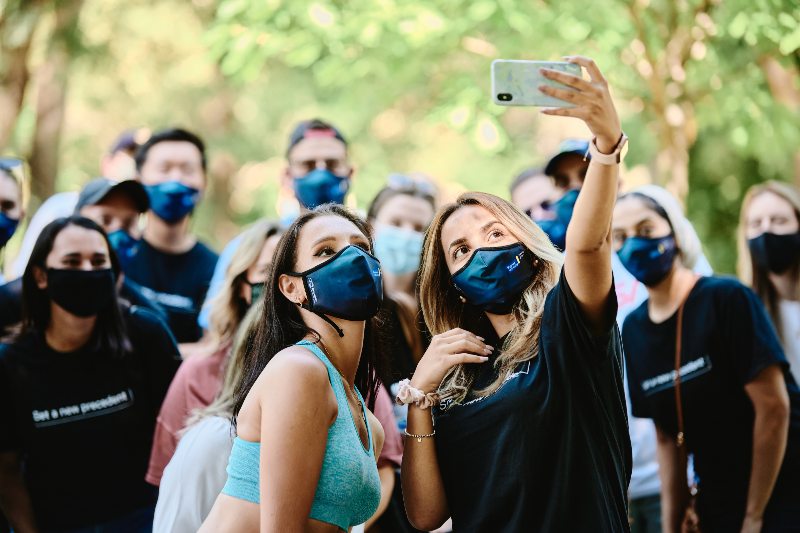 A group of students wearing masks at Orientation.