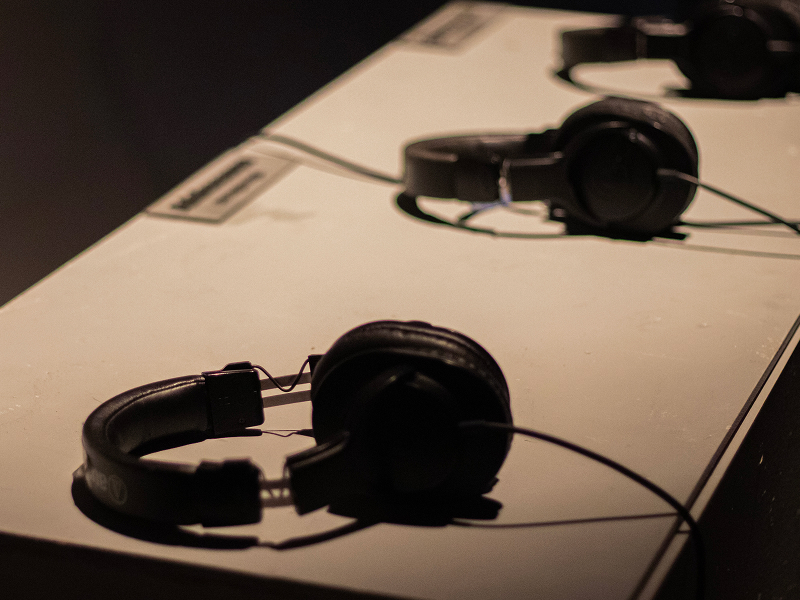 headsets laid out on a desk