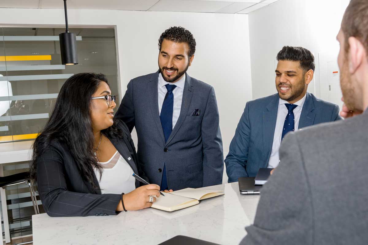 From left: Aliyah Dawood, fourth-year business technology management student; Arzan Bharucha, manager of advisory councils at TRSM and strategic lead at Business Innovation Hub; and Preyesh Karsan, senior content specialist, Business Development Communications at CIBC Mellon.   Photo by Clifton Li.