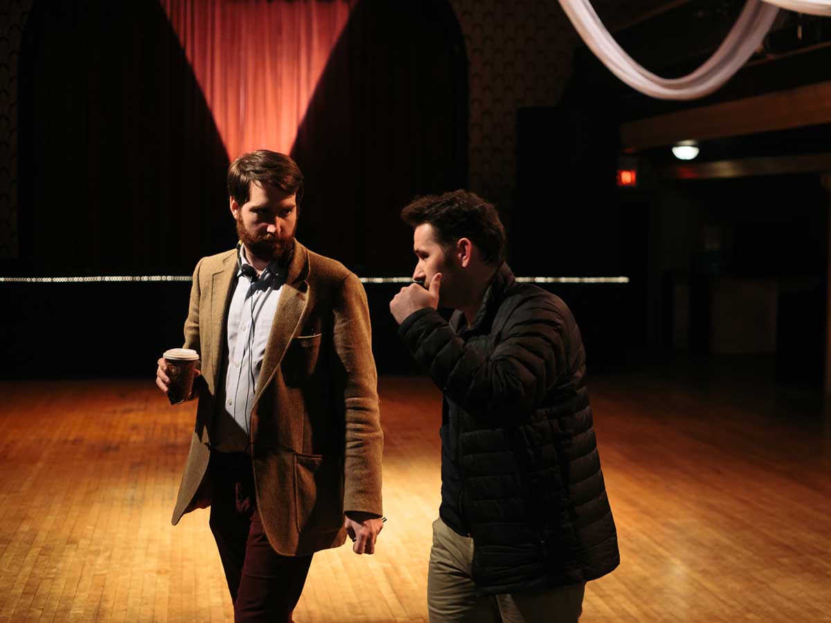 Photo: Writer and director Daniel Warth and Ryerson graduate Josh Clavir on the set of Dim the Fluorescents.
