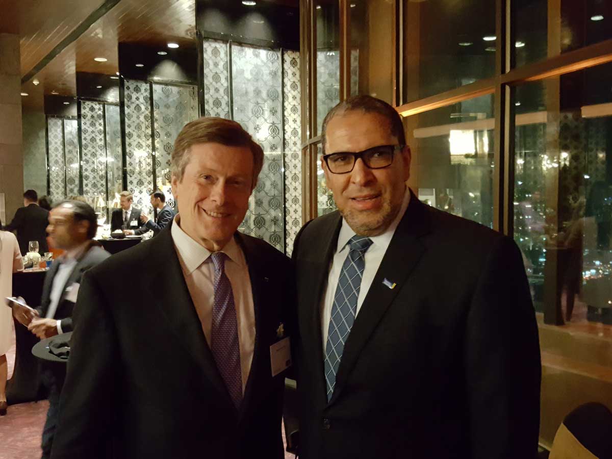 From left: John Tory and Mohamed Lachemi