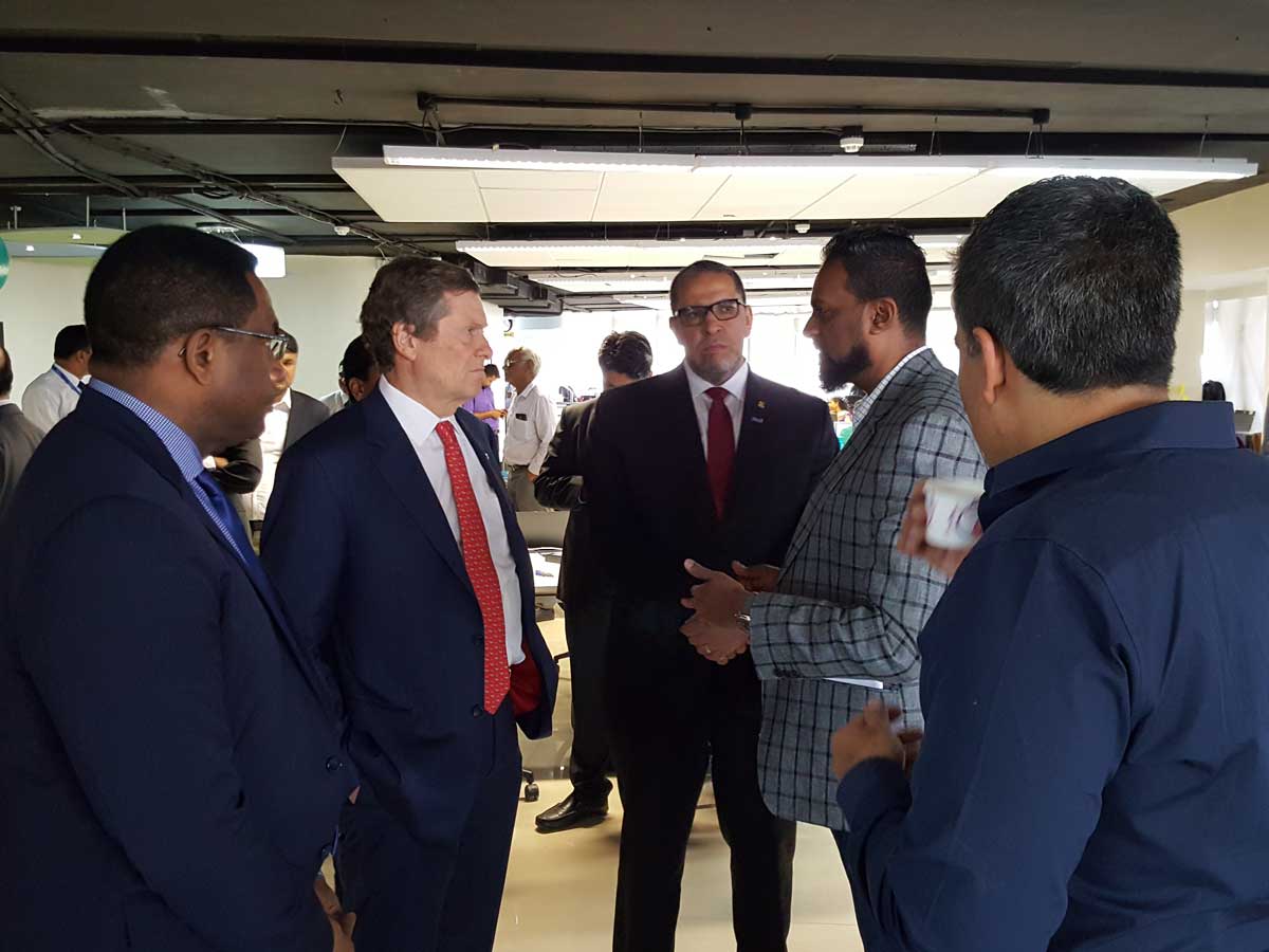 From left: Michael Thompson, John Tory, Mohamed Lachemi and Ajay Ramasubramaniam