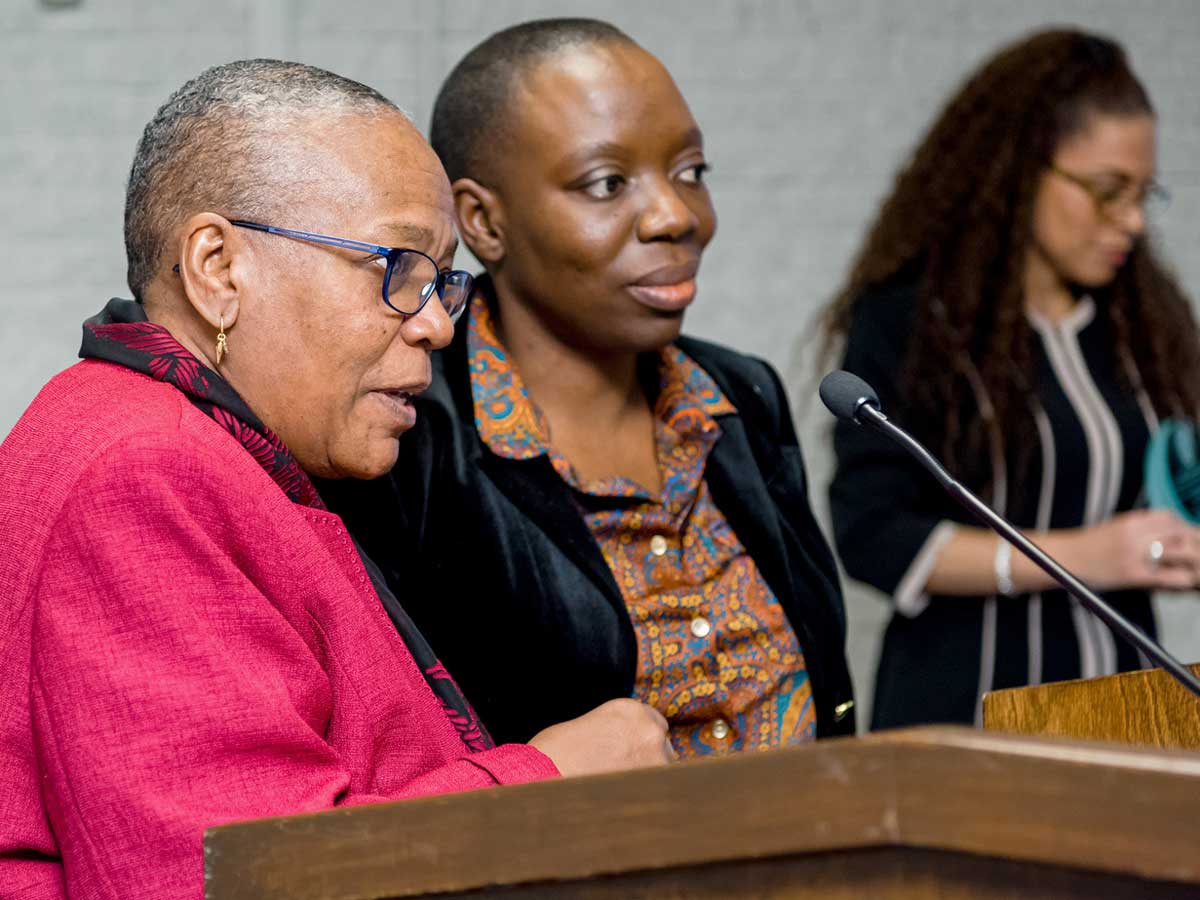 From left: Senator Wanda Thomas Bernard introduces Ryerson professor Annette Bailey