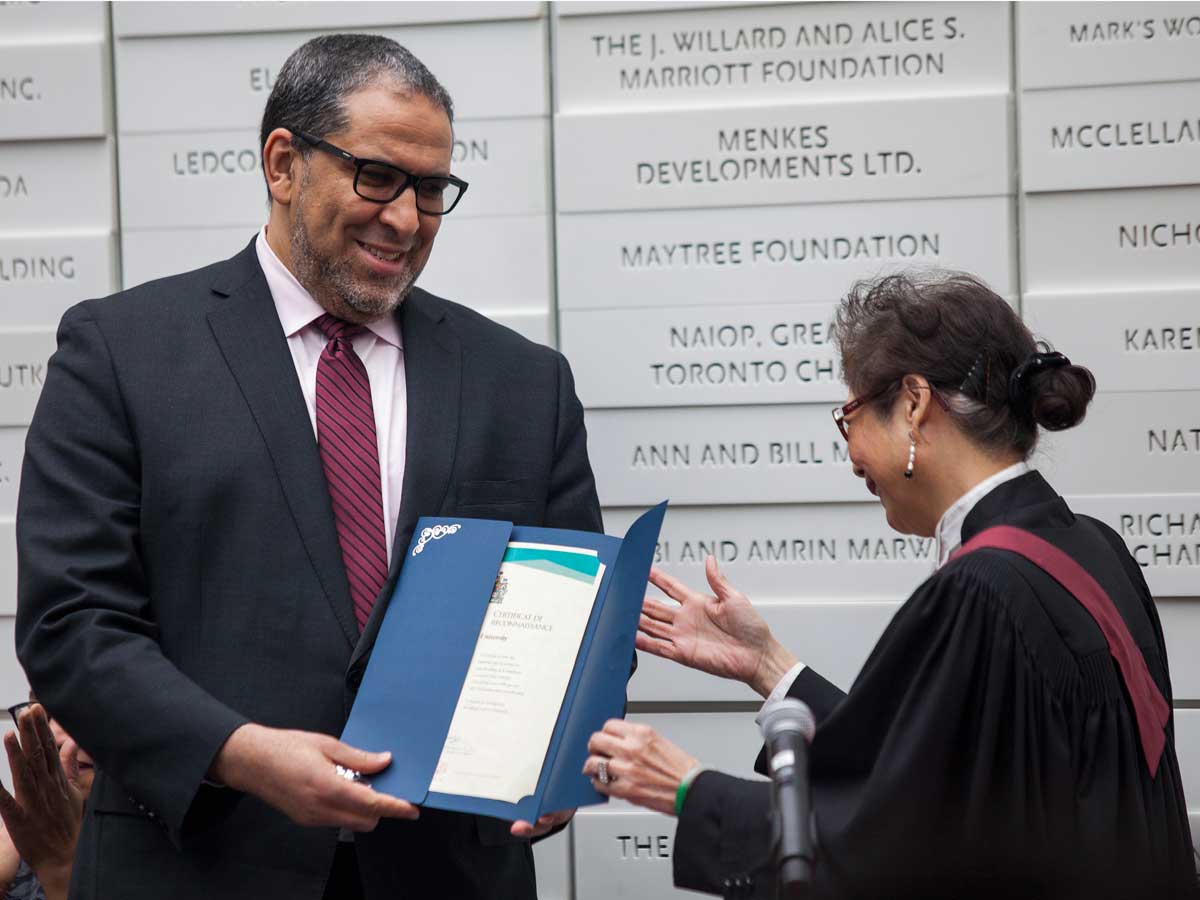 From left: President Mohamed Lachemi and immigration judge Nancy Siew