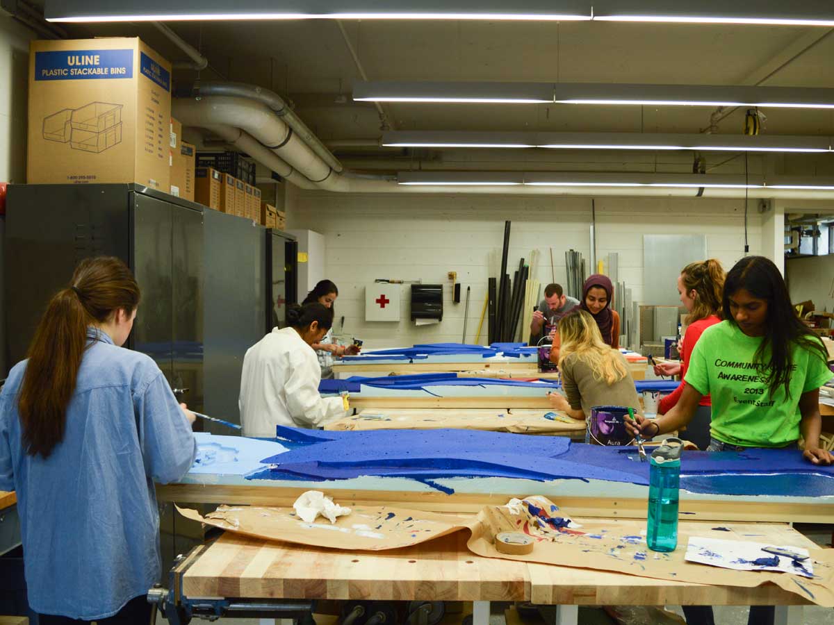 Students working on an installation in the lab