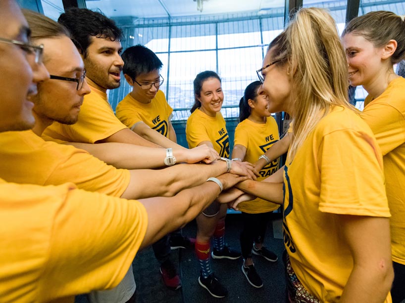 Fencing athletes cheering eachother