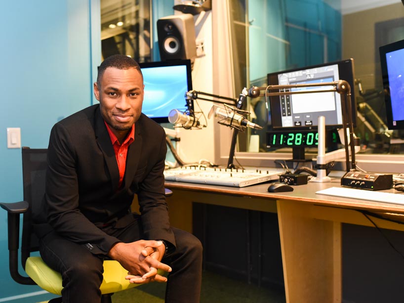 Professor Mark Campbell sits in the Allan Slaight Radio Institute Studios