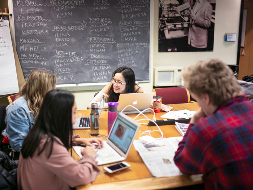 Students from the Ryerson School of Journalism plan the next issue of The Ryersonian at the Rogers Communications Centre