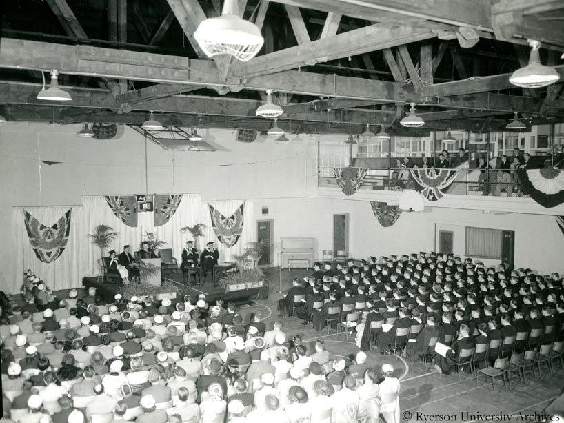 1953-54 convocation in the converted-garage gymnasium