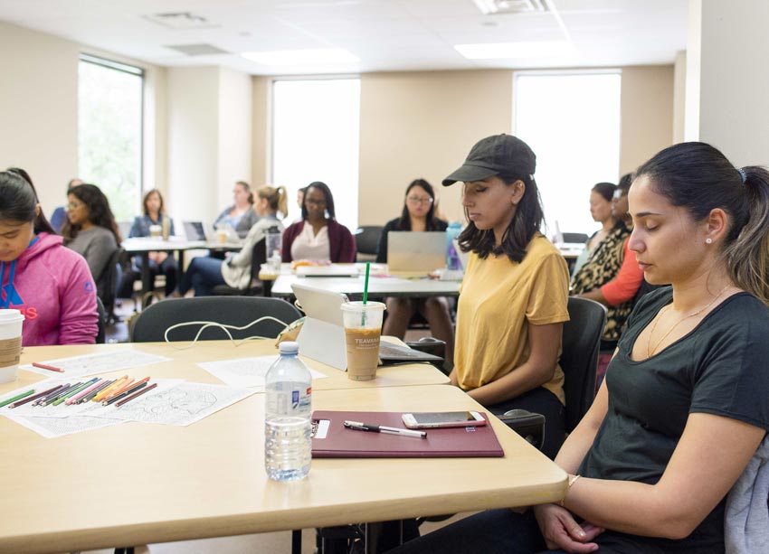 Nursing students practise meditation