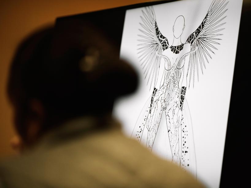 A design for a costume sketched on white paper