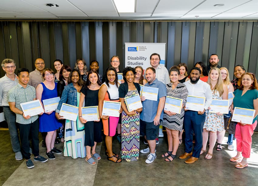 Group of students holding award certificates