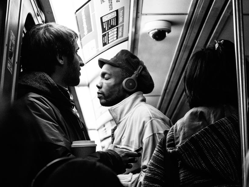 Standing passengers on subway train