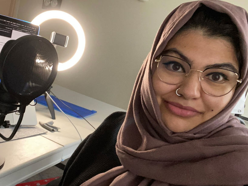 Ryerson alumna Mubashira Farooqi with her podcast equipment