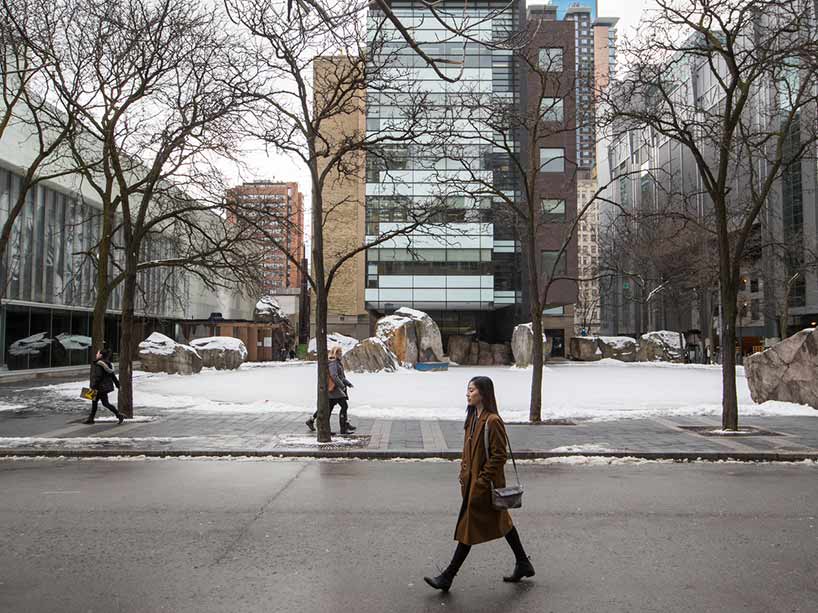 A woman walking on Ryerson’s campus in the winter