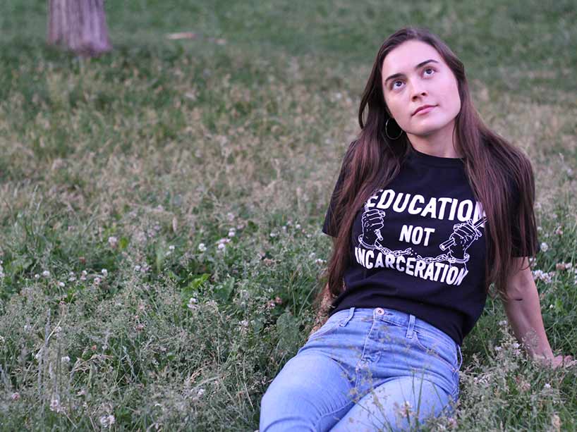 Alannah Fricker sitting on the grass