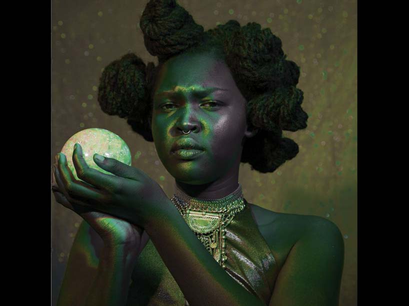 Photo of woman holding ball. 