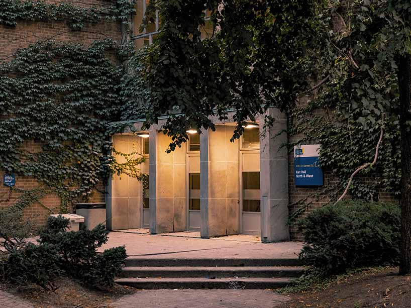 An entrance to Kerr Hall in the evening