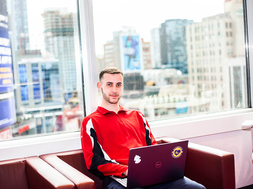 Liam Bell works on a laptop in the IBZ.