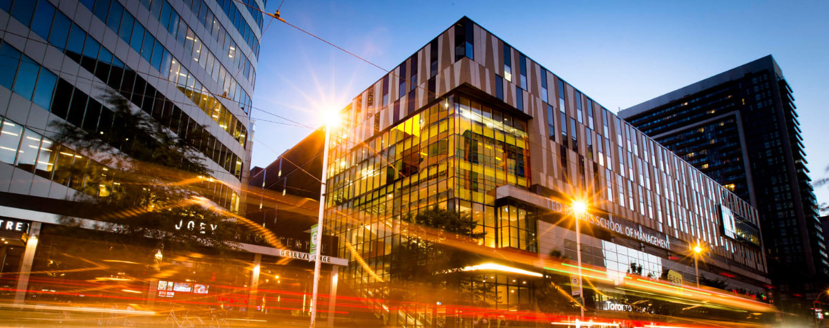 Students walking and congregating outside of the George Vari Engineering and Computing Centre. 