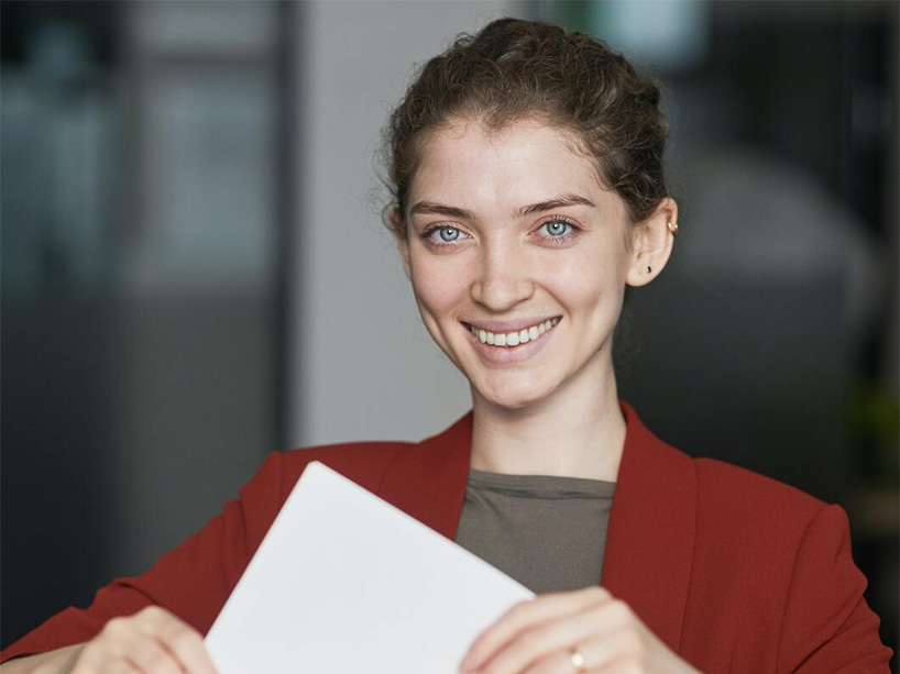 A woman casting a ballot.