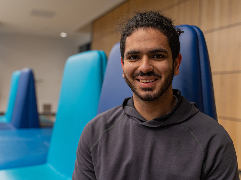 Sadra Hosseini in a gray hoodie.