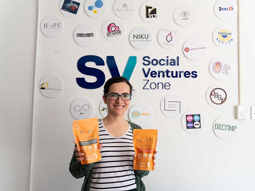 Sofia Bonilla with the Social Ventures Zone logo in the background. 