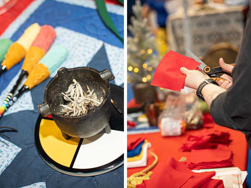 Tobacco in a black stone smudging dish. A volunteer cuts a red cloth with scissors.