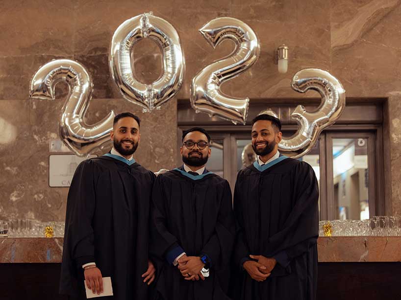 Pictured from left to right with 2023 balloons in the background: Harman Bath, Arshad Auckbarallee and Sandeep Patel.  Photo credit: Kenya-Jade Pinto.