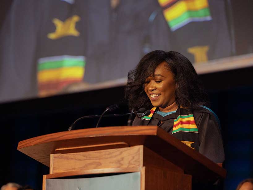 Safia Thompson Ramdoo at the podium.  Photo credit: Kenya-Jade Pinto.