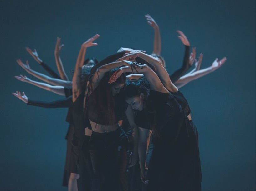 Contemporary dance formation pictured above from a performance titled: From me to you for us, RISE: Fall Dances 2022 by Jeremy Mimnagh. 