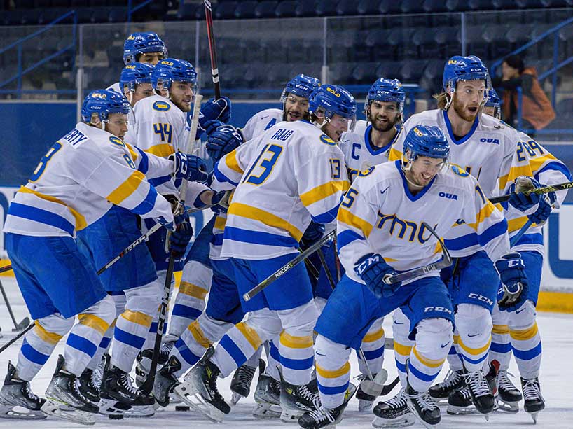 TMU Bold players come out of a pre-game huddle before the bronze medal match on Sunday, March 17.