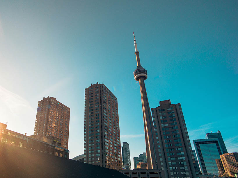 A cityscape of Toronto, including the CN Tower.