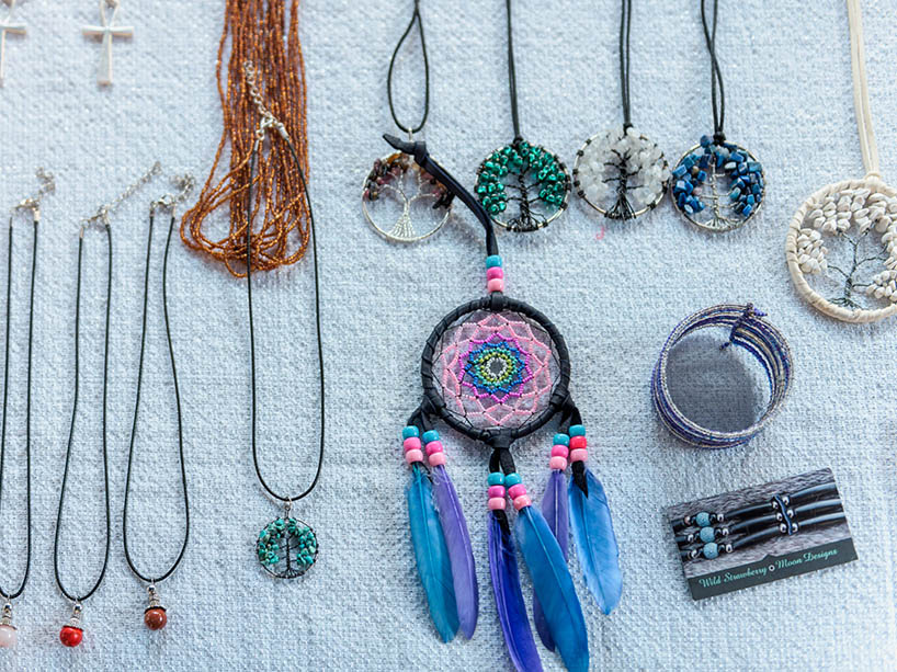 Jewelry and dream catcher at an Indigenous vendors marketplace.