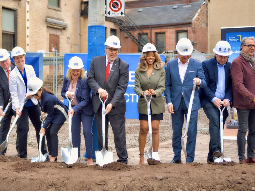 TMU leaders, students, and community members pose with shovels at the groundbreaking ceremony for the new Student Wellbeing Centre. 