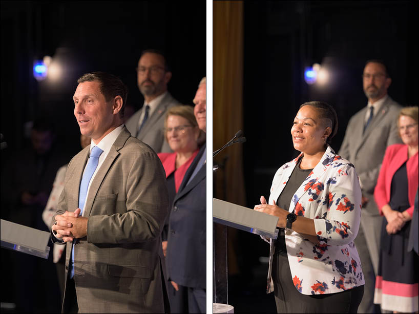 Minister Charmaine Williams and Minister Nolan Quinn speaking at podium. 