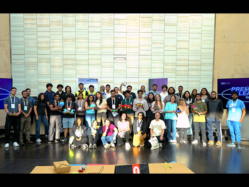 A group of people pose for a photo together.