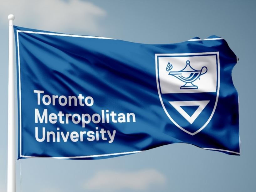 New TMU flag in blue and white shows the original symbols of the flag and set square, along with the university name.