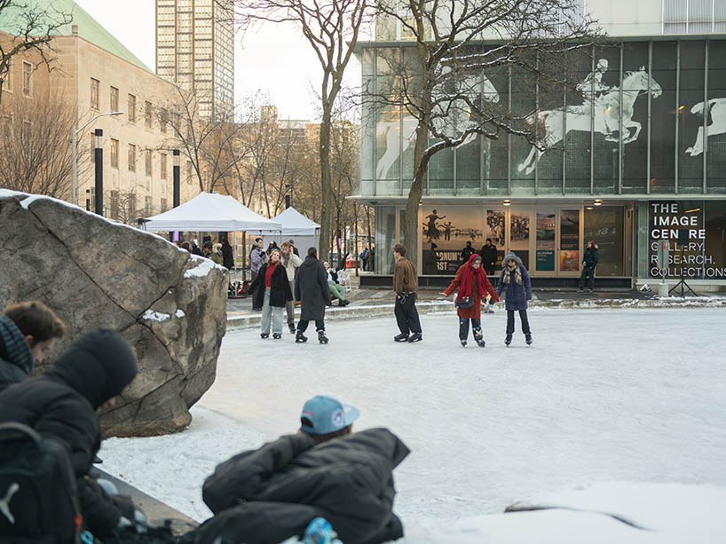 Community members skating on campus.