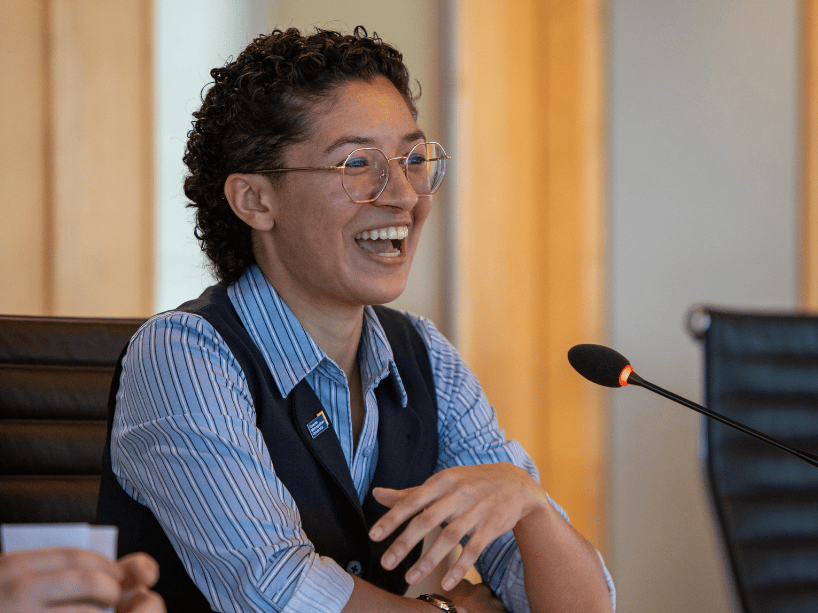 Cassandra Ferworn speaking on mic.