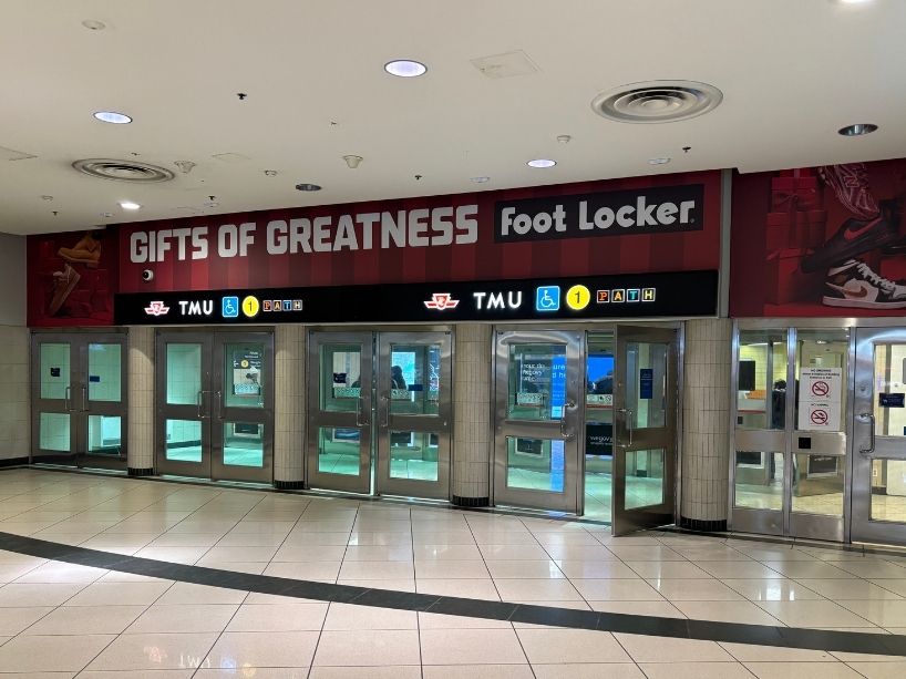 The wayfinding signage at TMU Station.