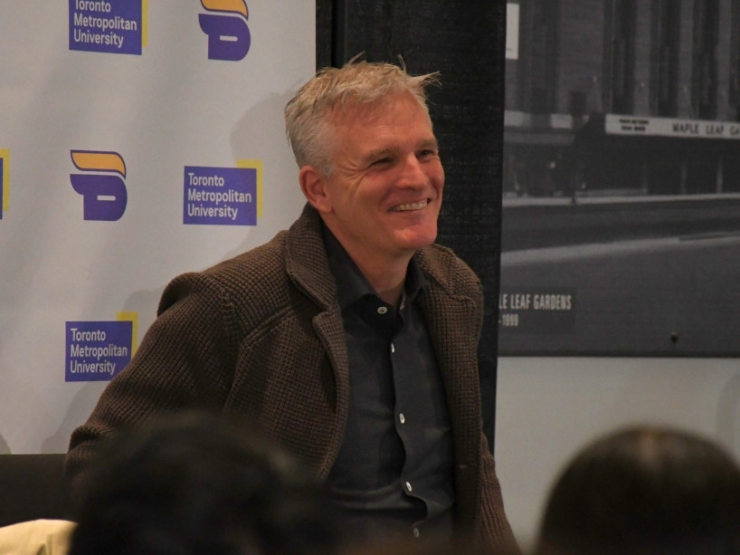 Rick Westhead smiles in a lighter moment on stage.