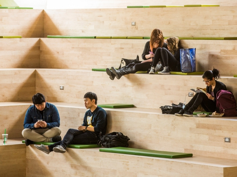 Students within the SLC on campus. 