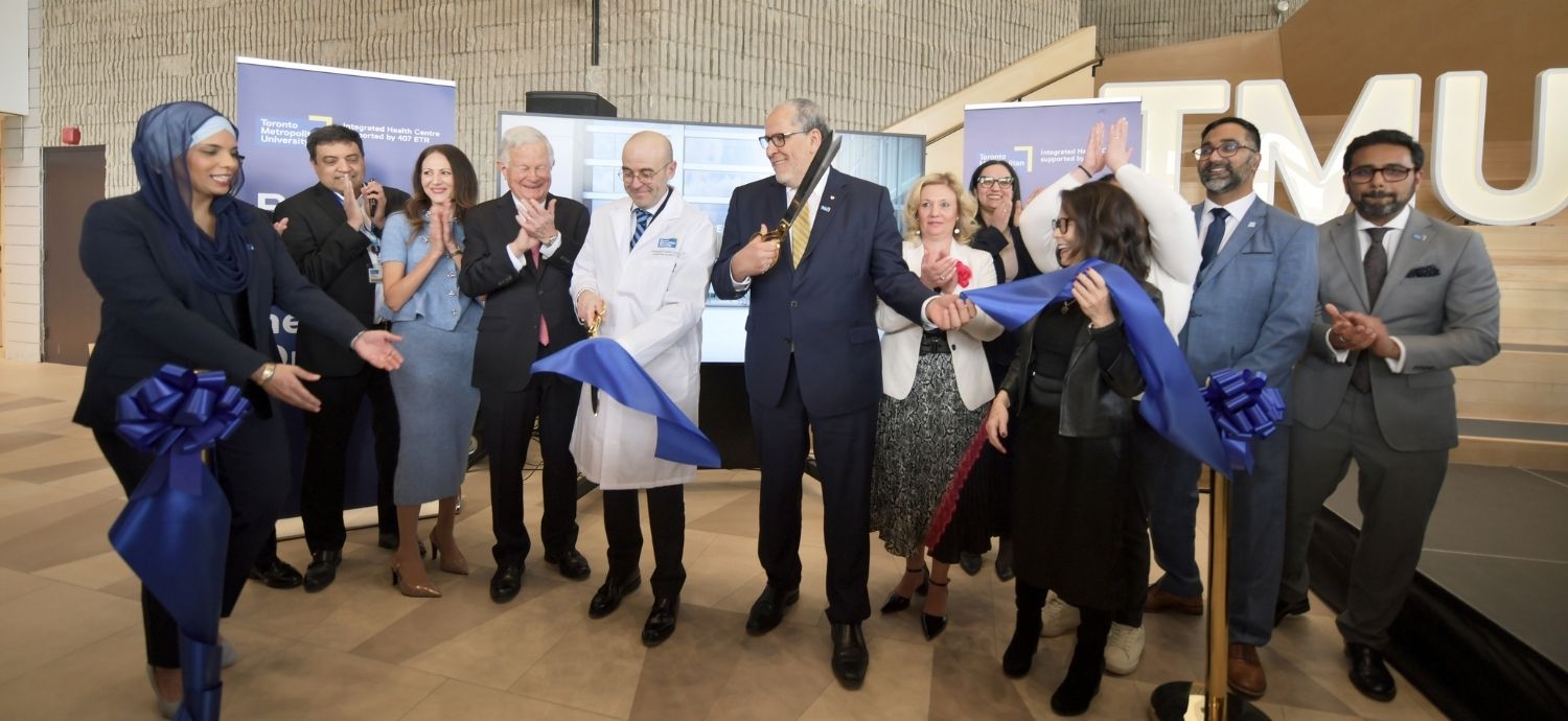 TMU leaders along with 407 ETR executive team members participate in a ceremonial ribbon cutting to officially open the new Integrated Health Centre.
